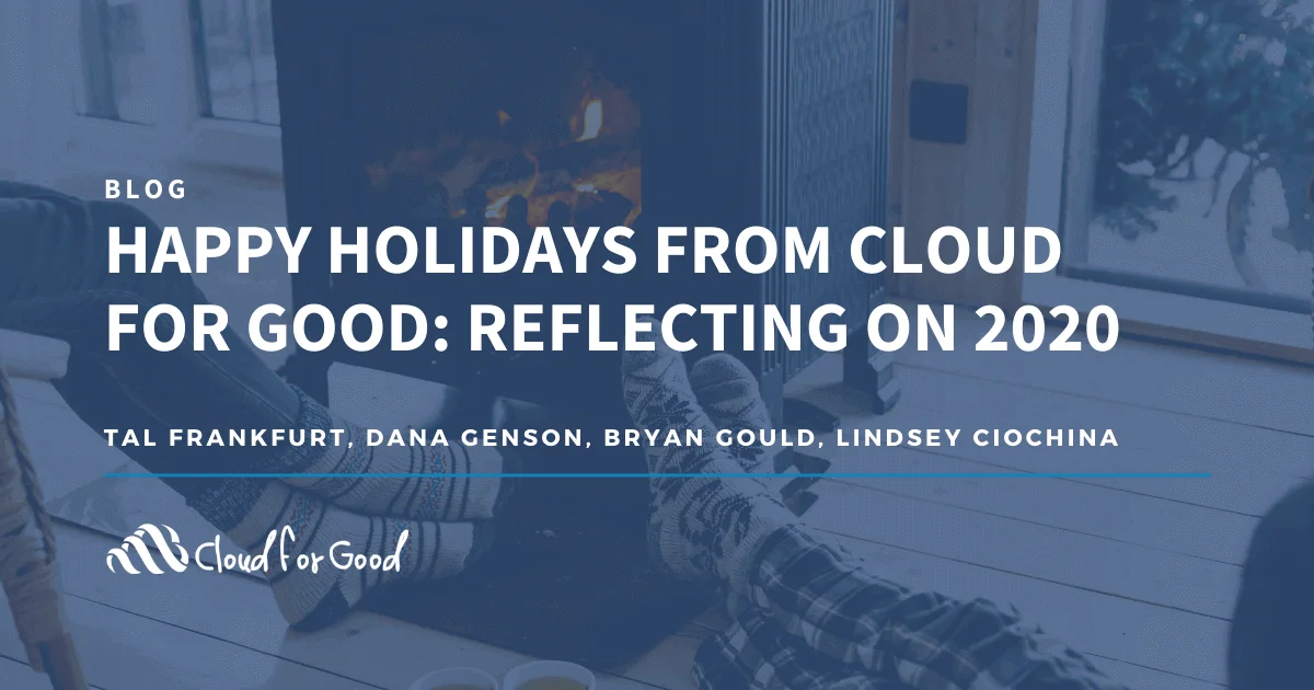 People's feet in cozy socks near a fireplace. Text: HAPPY HOLIDAYS FROM CLOUD FOR GOOD: REFLECTING ON 2020