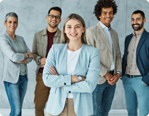 Group of diverse professionals standing together in a corporate office environment